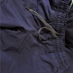 Jaanuu Navy jogger scrub pants with smoothing shorts lining